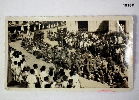 B & W photo showing a large group of Japanese prisoners