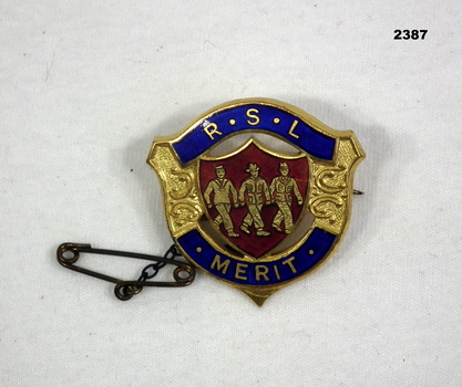 RSL Merit badge with small chain/pin.
