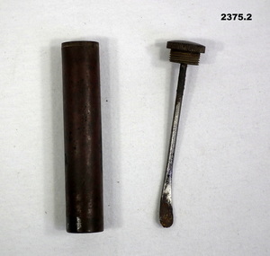 Oil bottle container for a weapon.