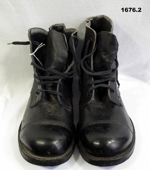 Pair of “AB” black boots