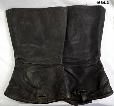 Pair of black military uniform gaiters, leggings.
