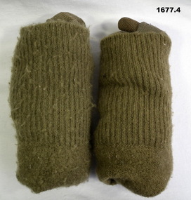Pair of woollen khaki army issue socks.