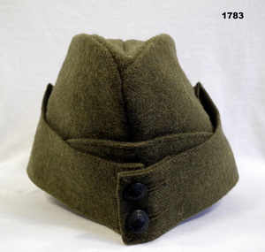 Khaki coloured issue Forage cap.