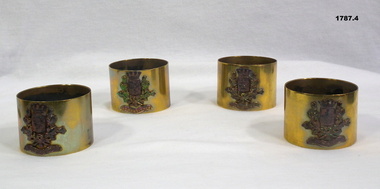 Four trench art napkin holders with town logo’s France