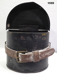 Half circle metal container with leather strap