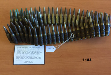 A link belt of 75 rounds of 7.62mm ammunition.