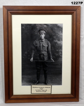 Black and white photo in a frame of a soldier WW1