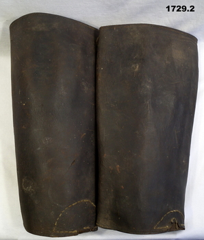 Pair of brown leather gaiters.