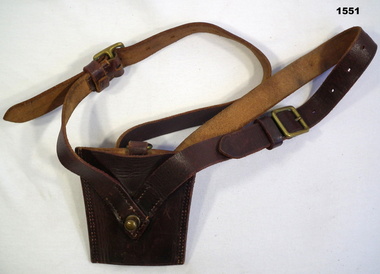 Brown leather scabbard holder for a sword