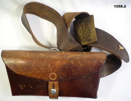 Brown leather pouch with belt and buckle