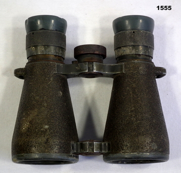 Pair of greenish coloured German binoculars