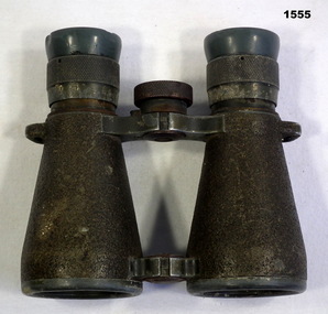 Pair of greenish coloured German binoculars