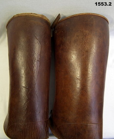 Pair of brown leather gaiters or leggings