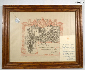 Certificate with ID disc and kings letter framed
