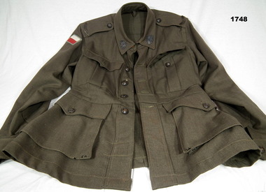 WW2 Battle dress jacket with accessories.