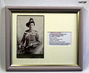 Framed photograph and detail re kings coronation.