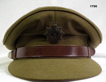 Khaki colour peak hat with medical corp badge