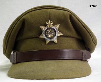 Peaked khaki hat with Transport Corp badge