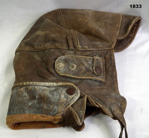 Brown coloured leather flying helmet