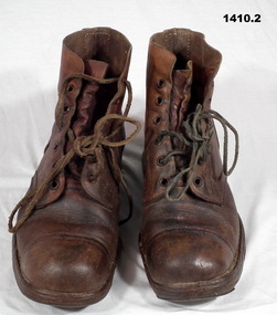Pair of brown WW2 boots with laces.