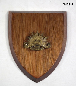 Rising Sun Badge on board plaque