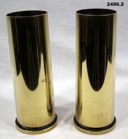 Two trench art vases made from shell casings.