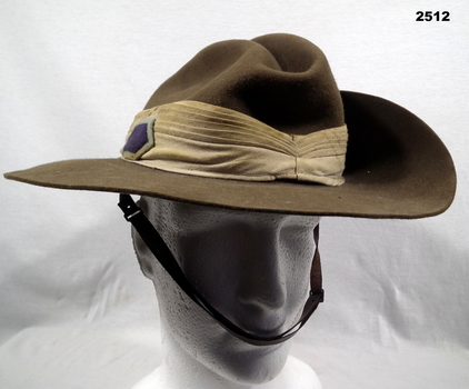 Slouch hat complete with pugaree, chin strap & colour patch.