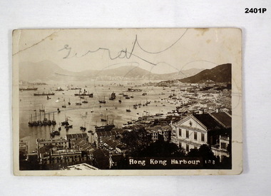 Postcard. Showing a view of Hong Kong harbour.