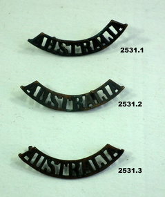 Two Australia shoulder badges.