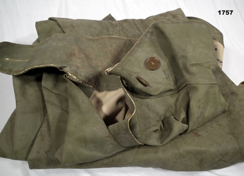 Rubberised surface gas cape with text inside