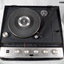 Showing the workings of a radio record player