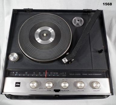 Showing the workings of a radio record player