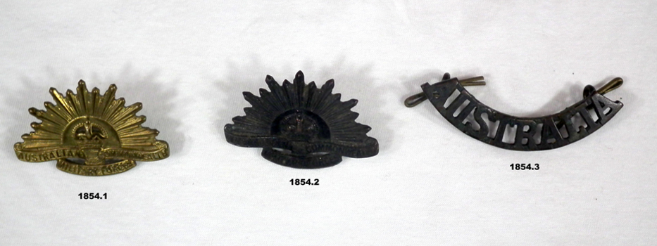 Two rising sun and one Australia badges