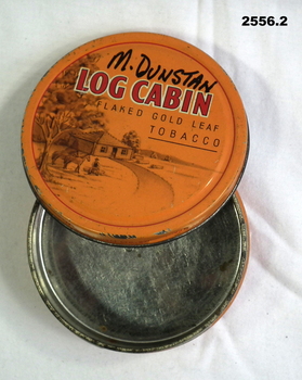 Log Cabin tobacco tin with name on.