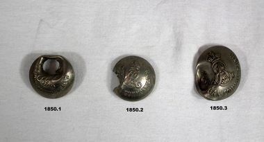 Uniform buttons damaged by ammunition