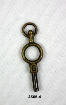 Small brass key for possibly a clock