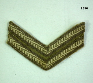 Set of cloth Corporal rank insignia.