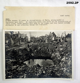 photograph and description of a mine crater.
