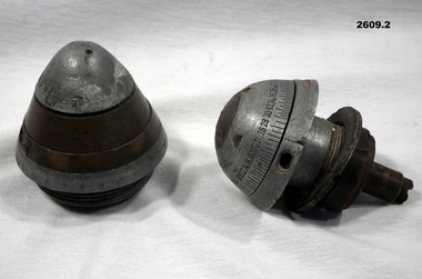 Two nose caps with graduations on.