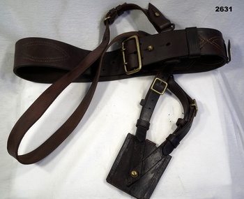 leather belt with soulder strap and pouch.