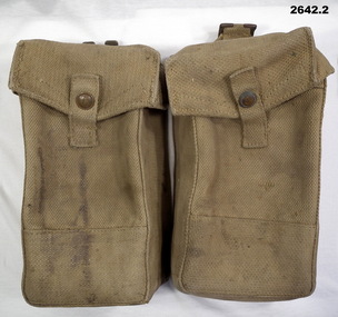 Two khaki webbing basic pouches.
