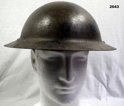 Metal British pattern steel helmet.