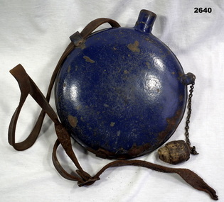 Enamel round water bottle with strap.