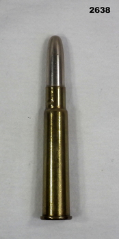 Brass cartridge case with silver coloured projectile.