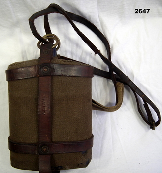 Metal water bottle with cover and carry straps.