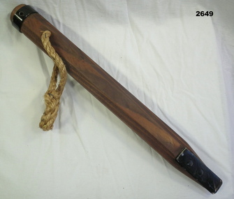 Wooden horse peg with rope and steel point.