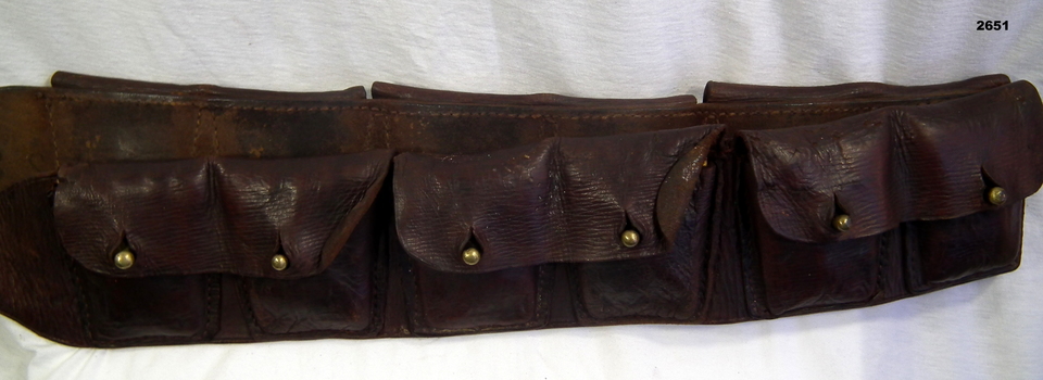 Leather  ammunition bandolier with 12 pouches.