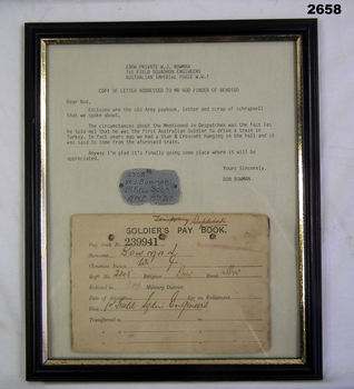 Soldiers pay book and details framed.