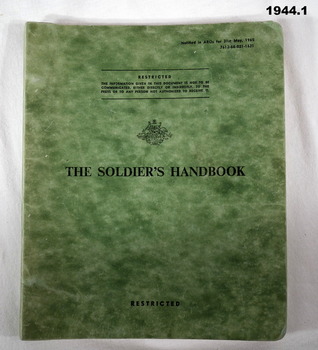 Green covered soldiers hand book.