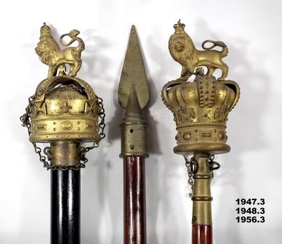 Wooden pike surmounted with metal replica of the Queen's crown.